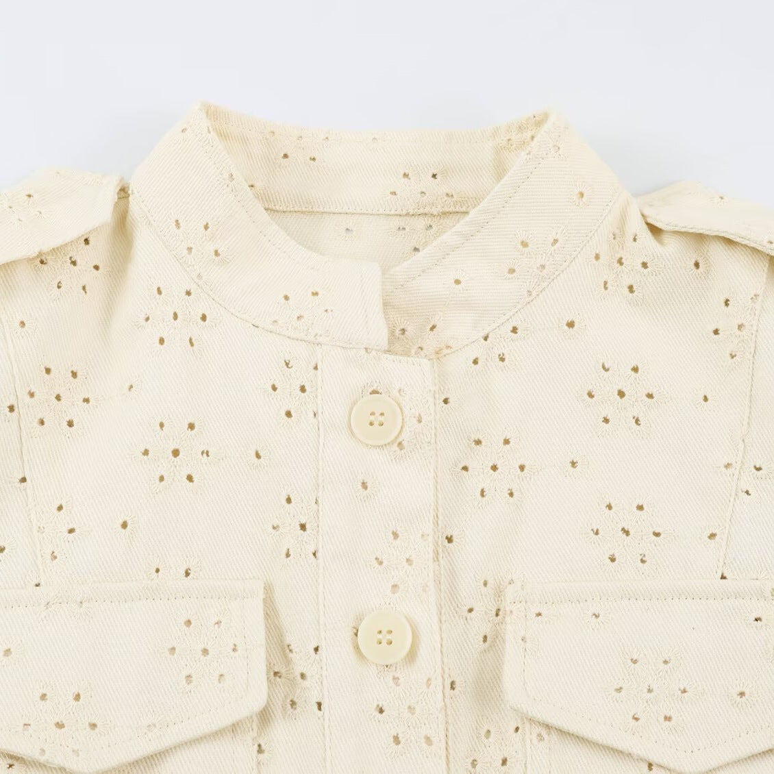 Women's short jacket made of lace embroidery with stand-up collar, utility pockets, and boxy cropped silhouette Fashion Glam