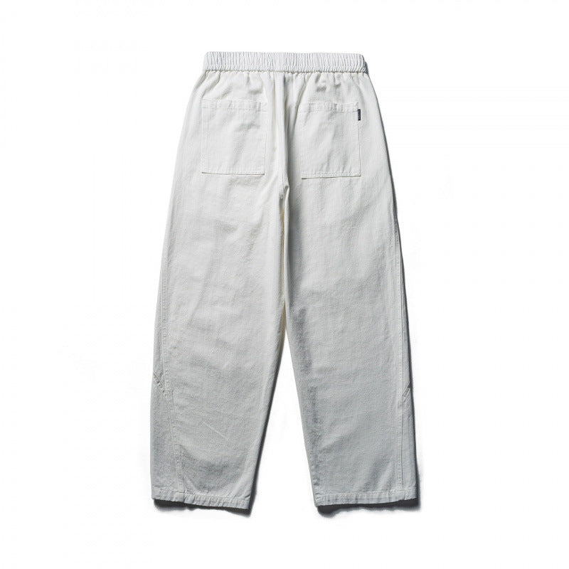 Unisex locker cut cropped leisure pants with elastic waistband, drawstring, and carabiner detail Fashion Glam