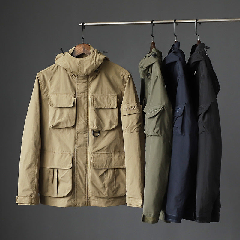 Men's urban field jacket with multiple pockets, wind-resistant surface and concealed hood Fashion Glam
