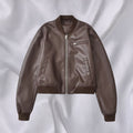 Women Short Leather Look Bomber Jacket with Ribbed Cuffs and Chest Zipper Pocket Fashion Glam