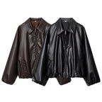Women's short-cut oversized blouse jacket made of vegan leather with shirt collar and elastic hem Fashion Glam
