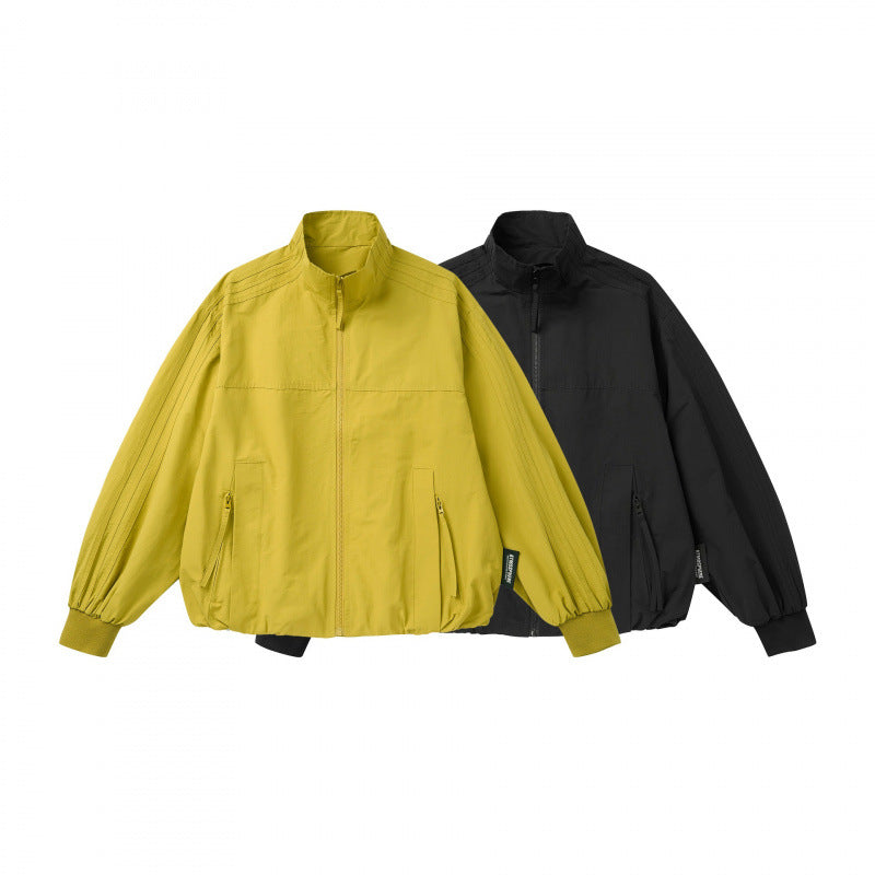 Unisex Lightweight Boxy Outdoor Jacket in Track Style with High Stand-Up Collar, Zipper Pockets and Elastic Hem Fashion Glam