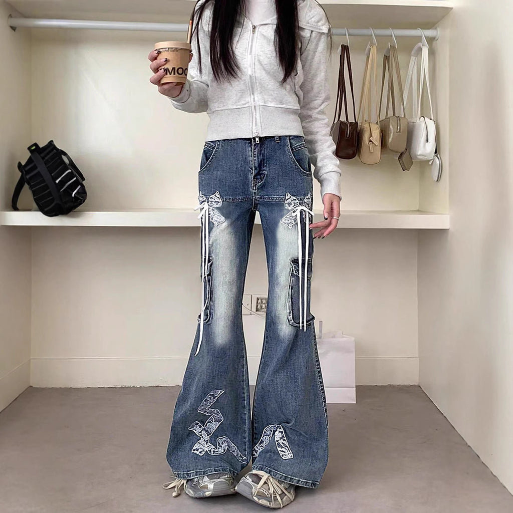Women's wide flared cargo-style jeans with decorative ribbons, lace appliqués, and multiple pockets Fashion Glam