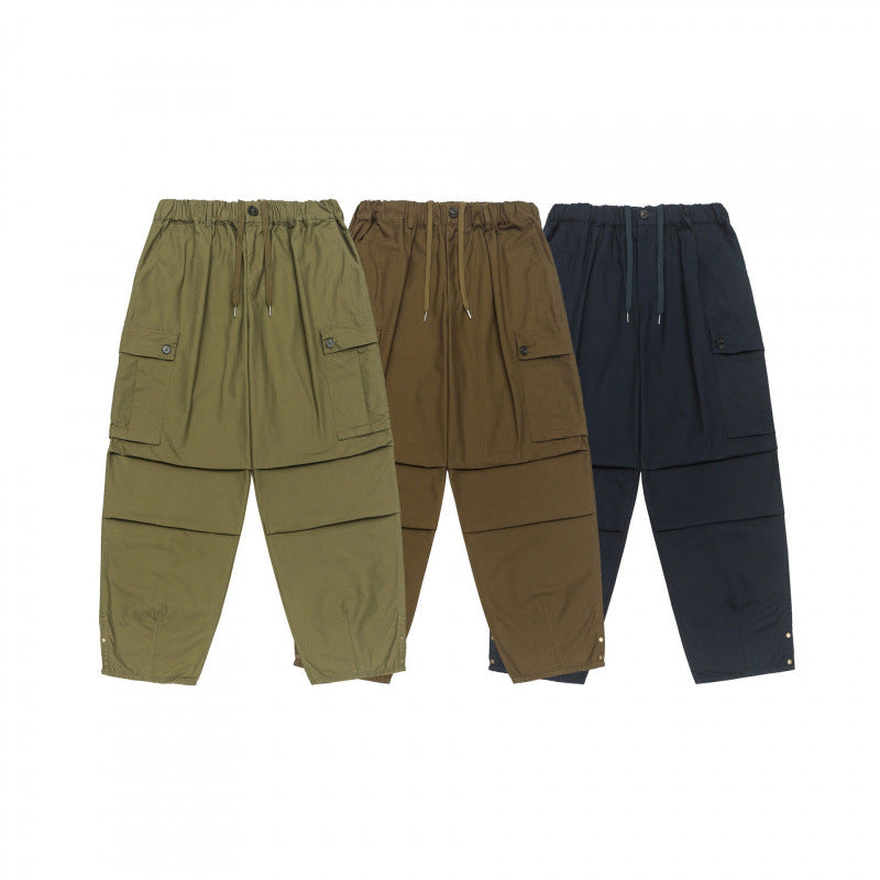 Unisex Oversize Cargo Pants with drawstring waistband, layer detail and snap hem Fashion Glam