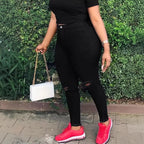 Women high-waisted body-shaping skinny jeans with knee rips and butt-lifting waistband Fashion Glam
