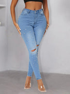 Women pearl-embellished high-waist skinny jeans with knee cutouts Fashion Glam