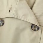 Women's short trench coat in boxy cut with double-breasted and belted waist Fashion Glam