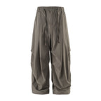 Unisex Loose-fitting technical cargo pants with elastic waistband, drawstring, and zip pockets Fashion Glam