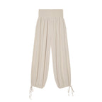 Women’s harem pants with high smock waistband, wide fall and adjustable cord closures Fashion Glam