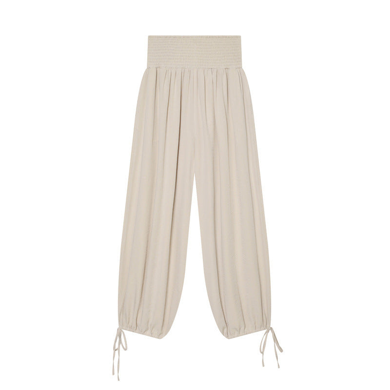 Women’s harem pants with high smock waistband, wide fall and adjustable cord closures Fashion Glam
