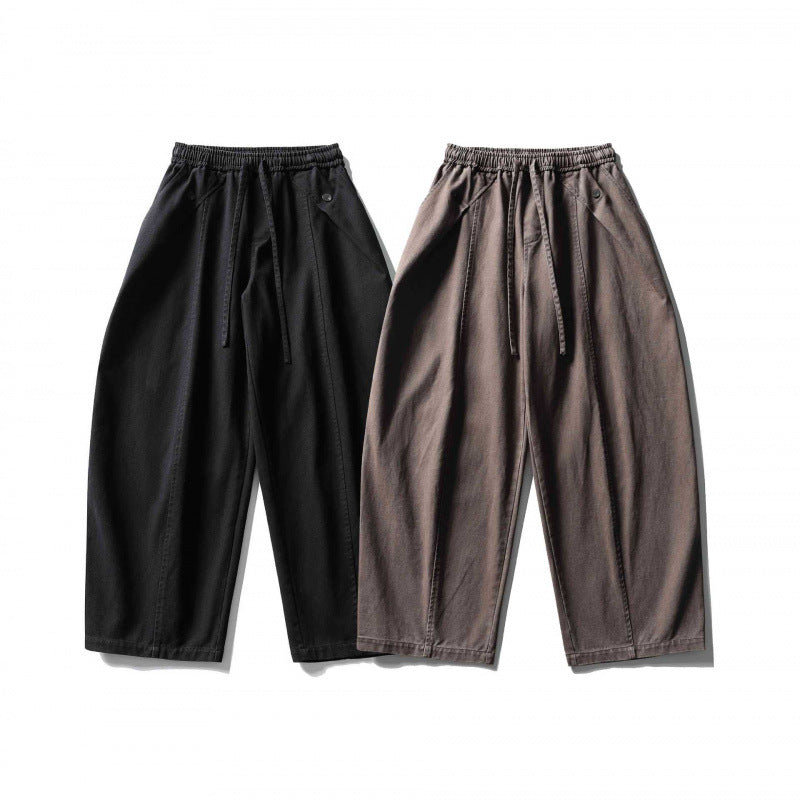 Unisex wide balloon pants made of cotton blend with drawstring waistband and decorative darts Fashion Glam
