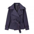 Women's short trench coat with double-breasted button placket, waist belt, and shoulder straps Fashion Glam