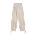 Women’s harem pants with high smock waistband, wide fall and adjustable cord closures Fashion Glam