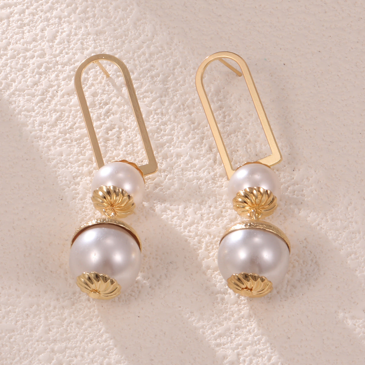 Ladies earrings with elegant pearl design Fashion Glam
