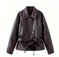 Women's short jacket made of faux leather with a belted waist and shirt collar Fashion Glam
