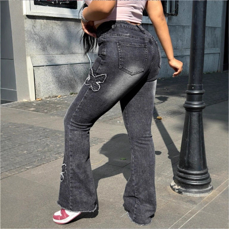 Ladies High-Waisted Flared Jeans with Butterfly Embroidery, Raw Hem and Sculpting Stretch Waistband Fashion Glam