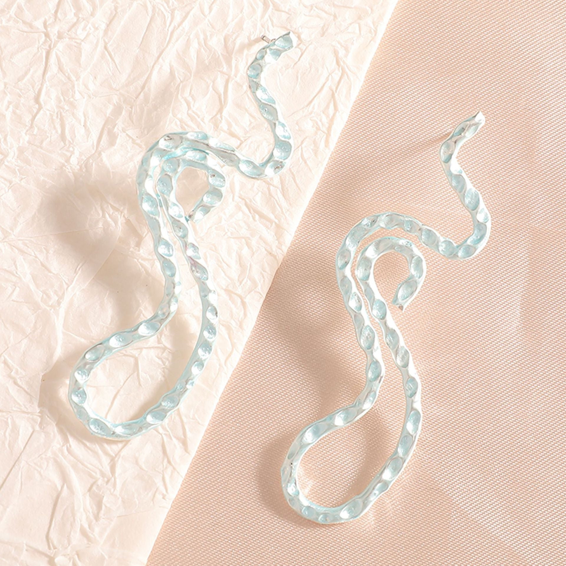 Ladies earrings in elegant wave pattern Fashion Glam
