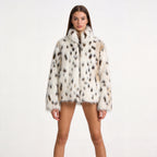 Women's short coat made of faux fur in spotted design with high collar Fashion Glam