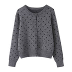 Women short cut fine knitted cardigan with round neckline, button placket and all-over polka dot pattern Fashion Glam