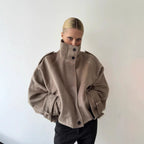 Women's short jacket made of wool blend with high stand-up collar, balloon sleeves and shoulder flaps Fashion Glam