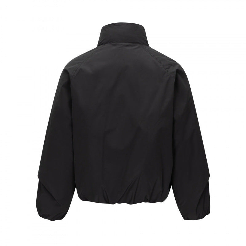 Unisex Short cut lightweight windbreaker in boxy cut with high stand-up collar and elastic hem Fashion Glam