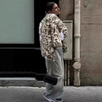 Women's short jacket made of synthetic fur in Dalmatian look with boxy silhouette and wide shawl collar Fashion Glam