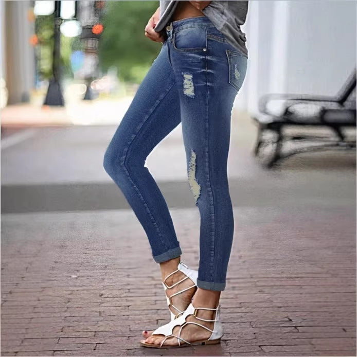 Women's Cropped Slim-Fit Denim Pants with mid-rise waist, cuffed hem and subtle used look Fashion Glam