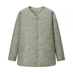 Women's oversized quilted jacket in cocoon cut with wave-shaped quilting and round neckline Fashion Glam