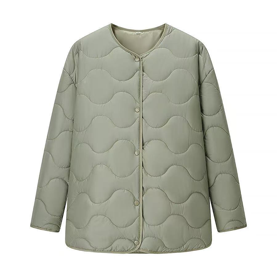 Women's oversized quilted jacket in cocoon cut with wave-shaped quilting and round neckline Fashion Glam