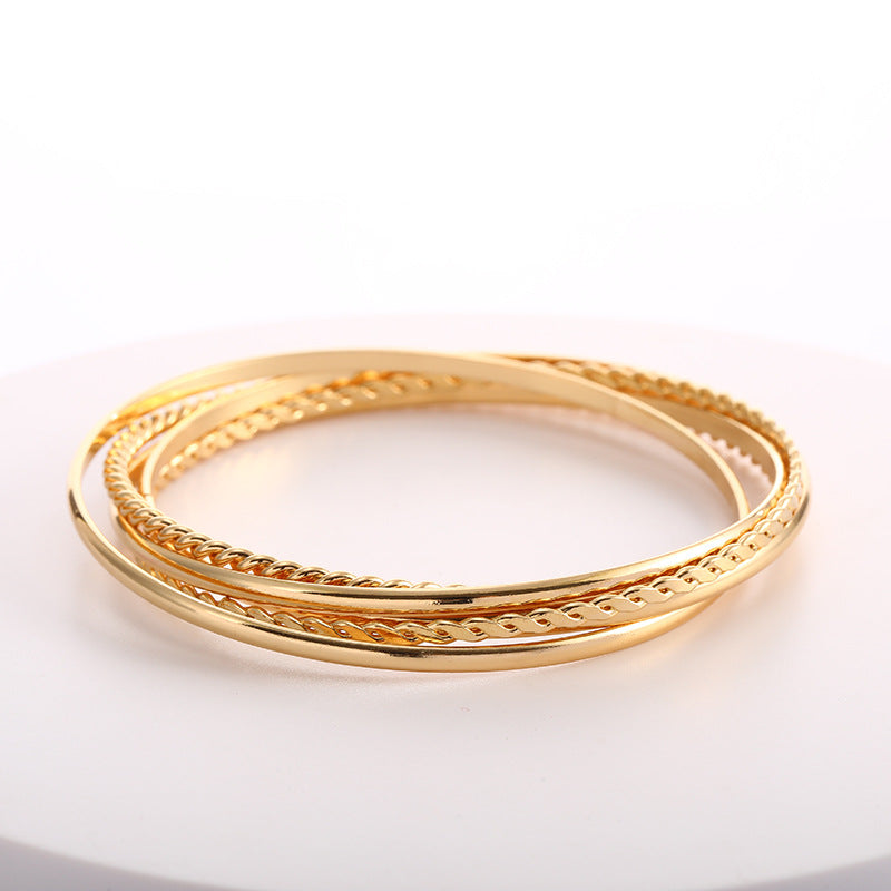 Women's bangle set with elaborate, braided and simple designs Fashion Glam