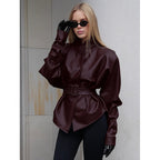 Women's leather look jacket with fitted belt and high stand-up collar Fashion Glam