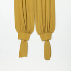 Women’s harem pants with high waistband, pleated folds and knotted cuffs Fashion Glam