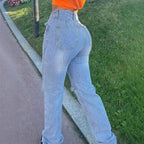 Women's high-waisted jeans with straight leg, knee rips, and stacked hem Fashion Glam