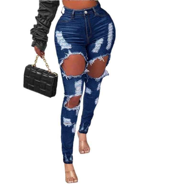Ladies high-waisted skinny jeans with XXL knee cutouts, heavily distressed used look and sculpting cut Fashion Glam