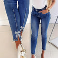 Women's skinny jeans with pearl embellishments and decorative bows Fashion Glam