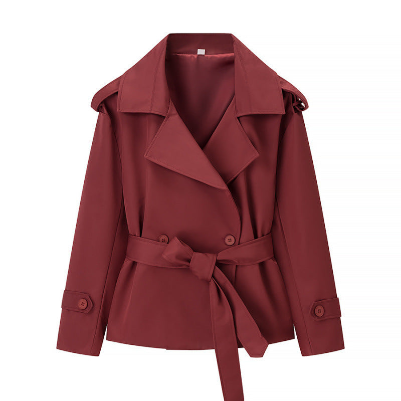 Women's short trench coat with double-breasted button placket, waist belt, and shoulder straps Fashion Glam