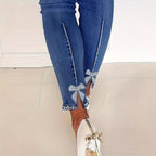 Women's skinny jeans with pearl embellishments and decorative bows Fashion Glam