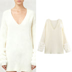 Ladies fine knit mini dress with deep V-neckline and layered faux fur sleeves Fashion Glam