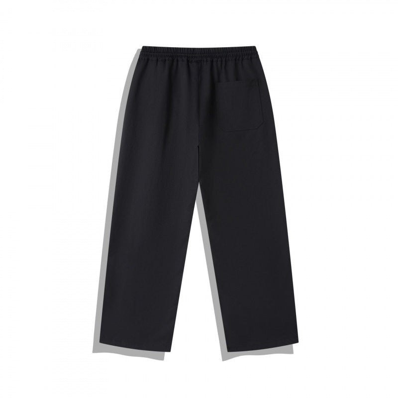 Unisex Wide Relaxed Pants with Elastic Waistband, Drawstring and Decorative Stitching Fashion Glam