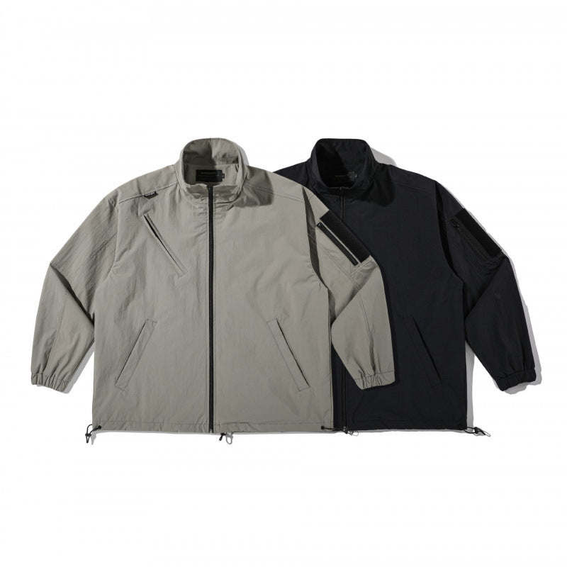 Unisex Lightweight Technical-Utility Jacket with Stand Collar, Zipper Pockets and Drawstring Hem Fashion Glam
