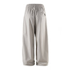 Unisex Loose-fitting technical cargo pants with elastic waistband, drawstring, and zip pockets Fashion Glam
