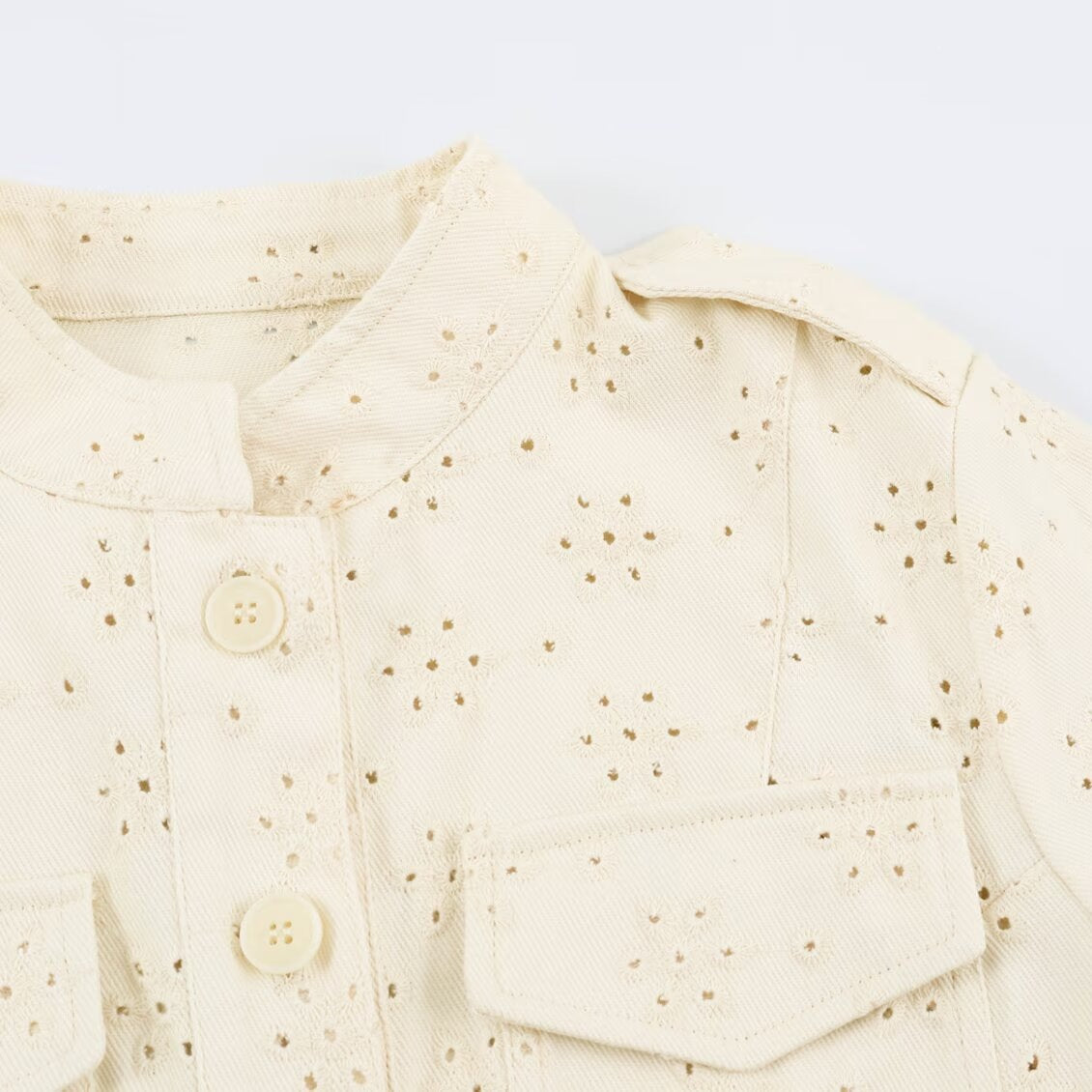 Women's short jacket made of lace embroidery with stand-up collar, utility pockets, and boxy cropped silhouette Fashion Glam