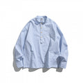 Men's oversized shirt with stand-up collar and half button placket as well as front pockets Fashion Glam