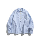 Men's oversized shirt with stand-up collar and half button placket as well as front pockets Fashion Glam