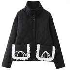 Women’s quilted jacket with stand-up collar and contrasting ruffled pockets Fashion Glam