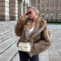 Women's short-cut voluminous faux fur jacket with oversized shawl collar Fashion Glam