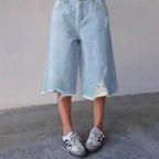 Women's Wide Denim Culotte with High Waist, Distressed Details and Raw Hem Fashion Glam