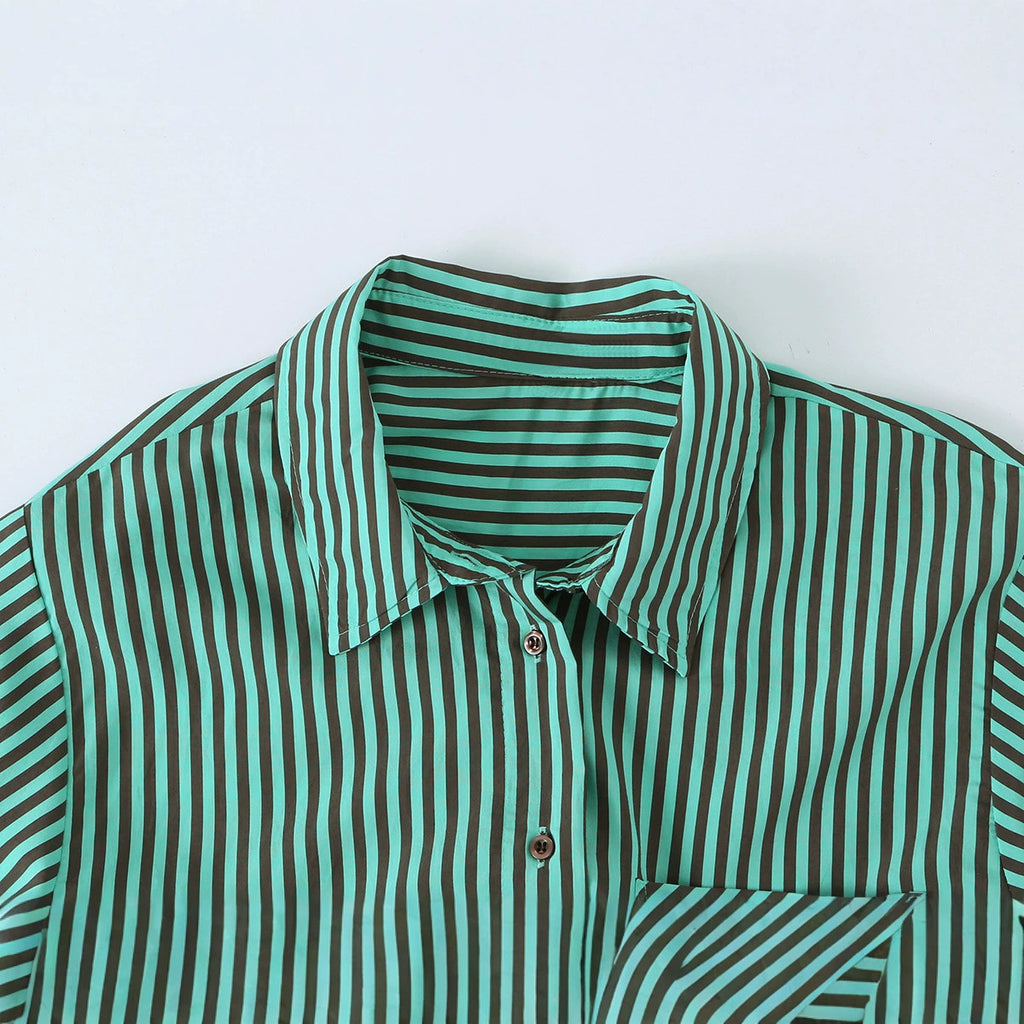 Women's oversized shirt with diagonal striped design, asymmetrical hem, and chest pocket Fashion Glam
