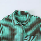 Women's oversized shirt with diagonal striped design, asymmetrical hem, and chest pocket Fashion Glam