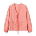 Ladies Playful V-Neck Blouse with Ruffled Heart Pockets and Front Ties Fashion Glam